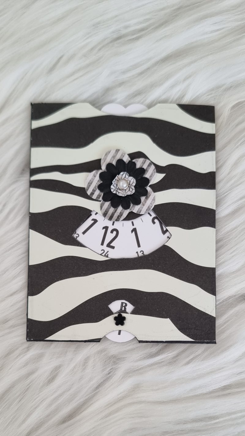 Voeding schijf zebra, zwart wit, met grote bloem in het midden. Draaischijf voor het bijhouden van de laatste voeding