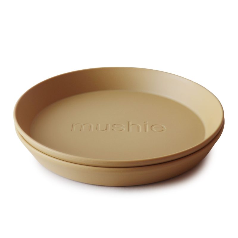 Mushie bord rond Mustard. Product foto, twee borden in elkaar gestapeld