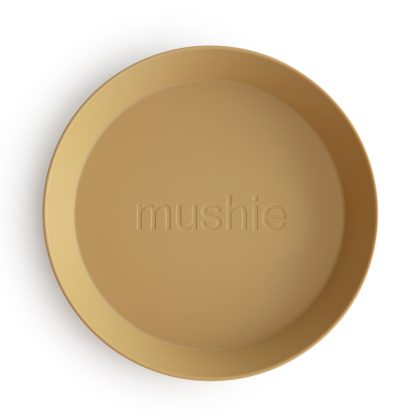 Mushie bord rond Mustard. Product foto